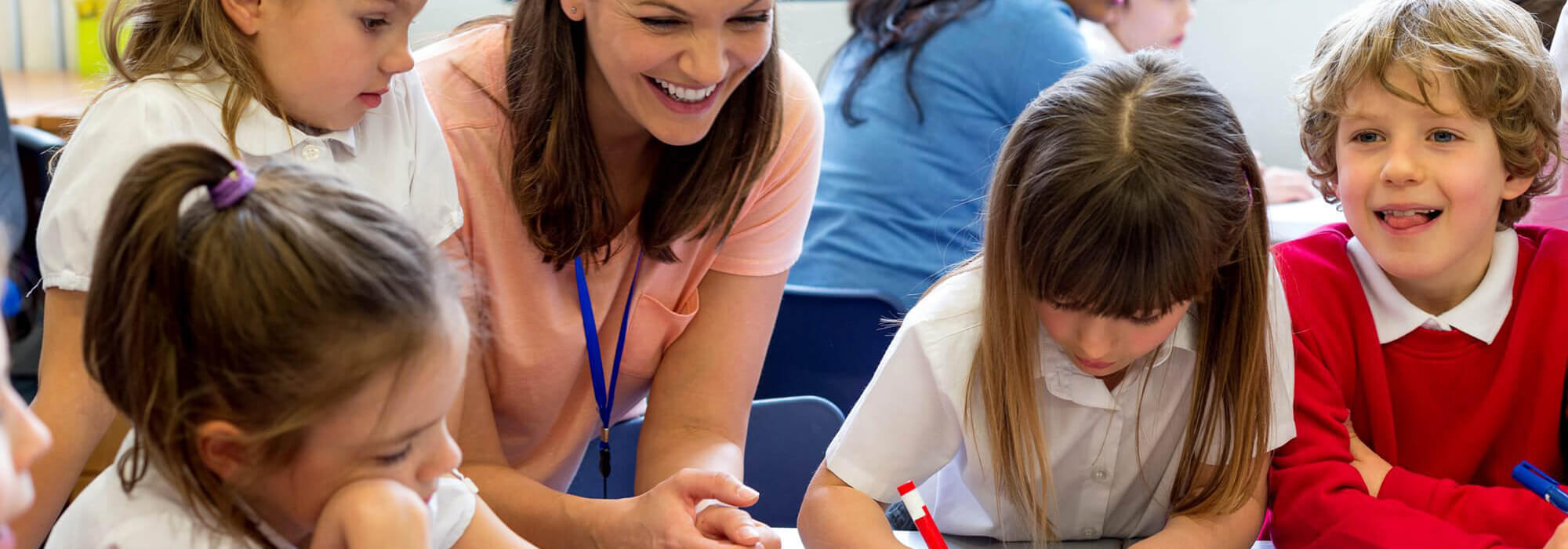 Teaching assistant with young children