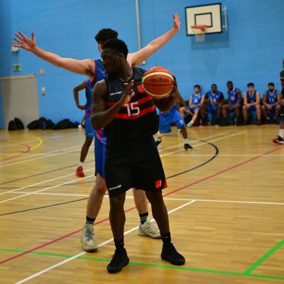 Point guard number 15 controls the pace of the offence as he decides his next move