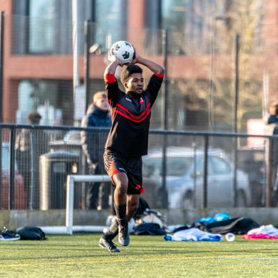 Staffs player makes a throw in 