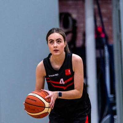 Staffs player number 4 makes an attempt at a 2 pointer during warm up