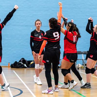 Staffs celebrate after a point is won
