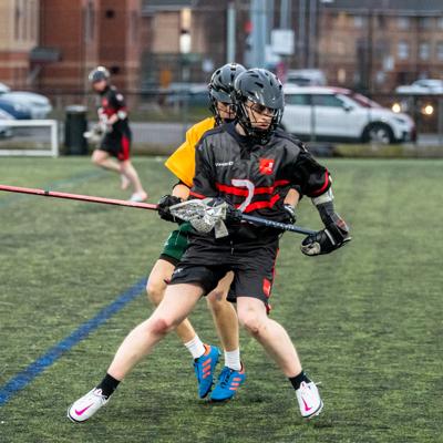 Staffs player number 7 is pressured by Nottingham with close coverage