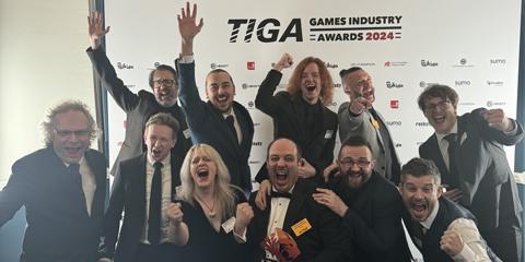 Team of people in celebratory mood